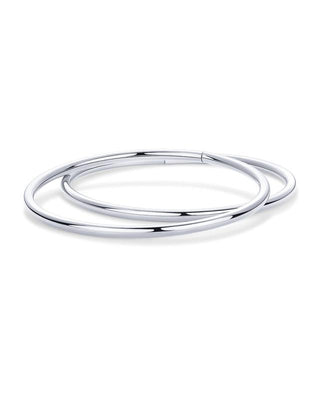 Two silver bangles showing the hinge