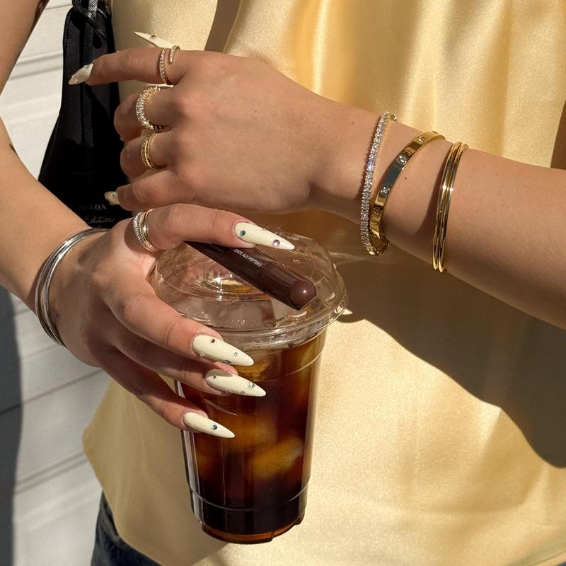 Gold and silver bangles stacked and worn every day