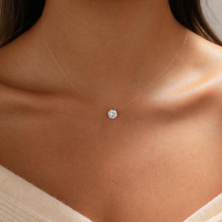 Round floating pendant necklace worn on the neck