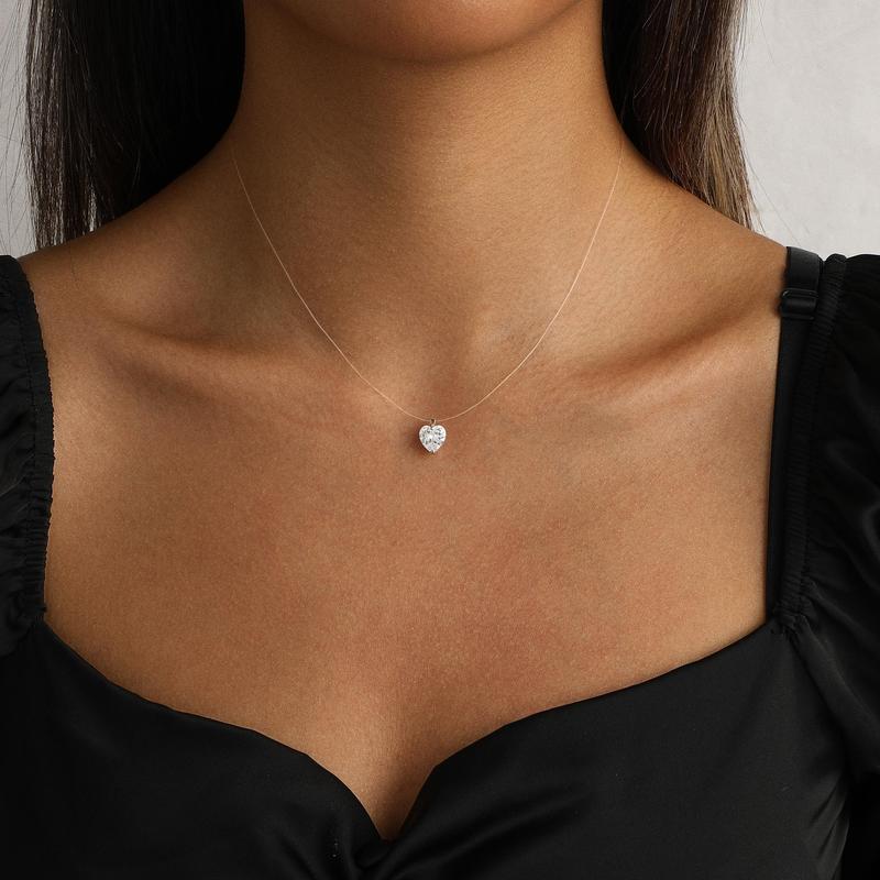 Heart floating pendant necklace worn on the neck