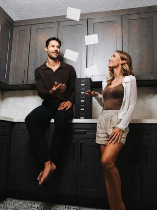Couple in the laundry room with Avera Laundry Sheets