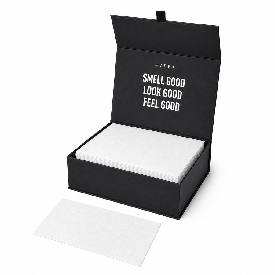 Avera Laundry Sheets gift box open with a neat stack of white sheets