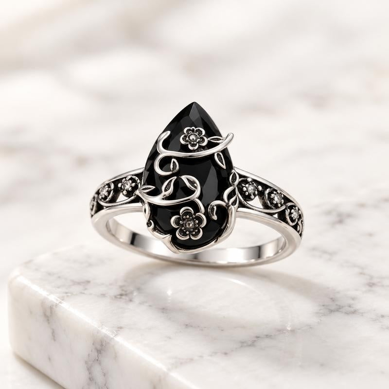 Avera Black Obsidian Ring on a marble block