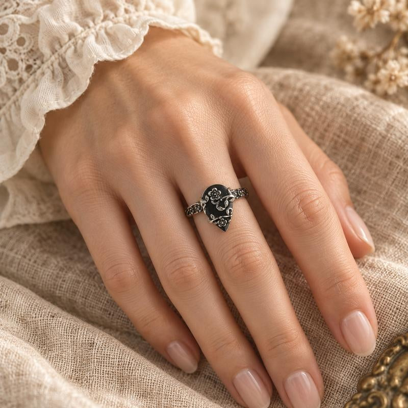 Black Obsidian Ring worn with a lace sleeve