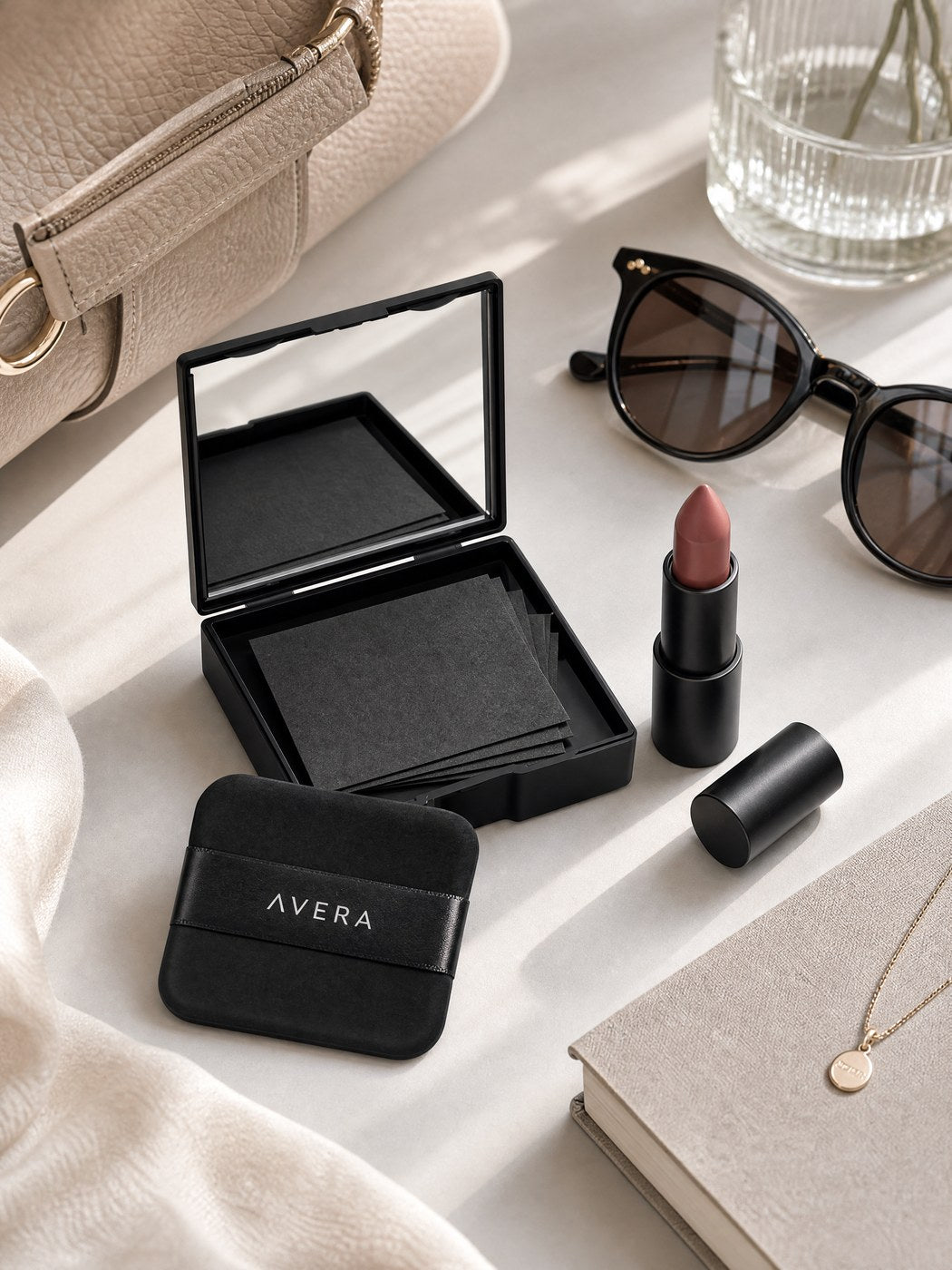 A compact, a mirror and a puff