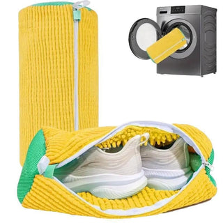 Avera Shoe Washing Bag open with a pair of trainers inside, beside a washing machine