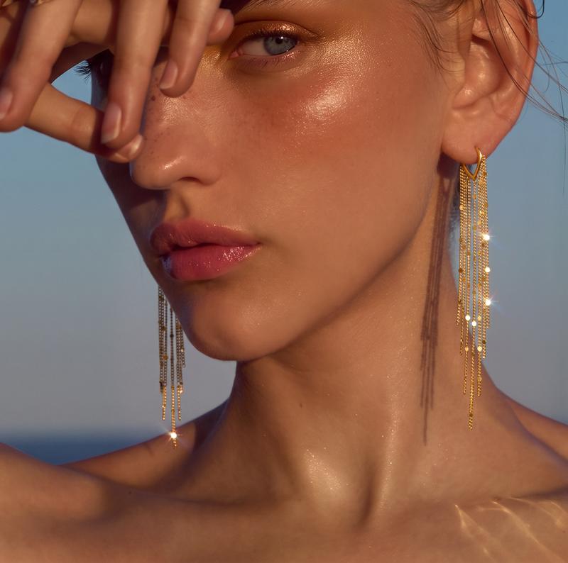 Worn in sunlight, the cut discs catching the light