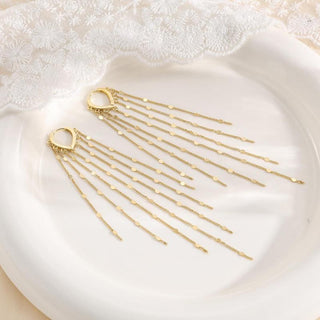 The pair on a ceramic dish beside lace