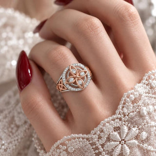 Close-up of the Avera Witch Knot Ring on the finger