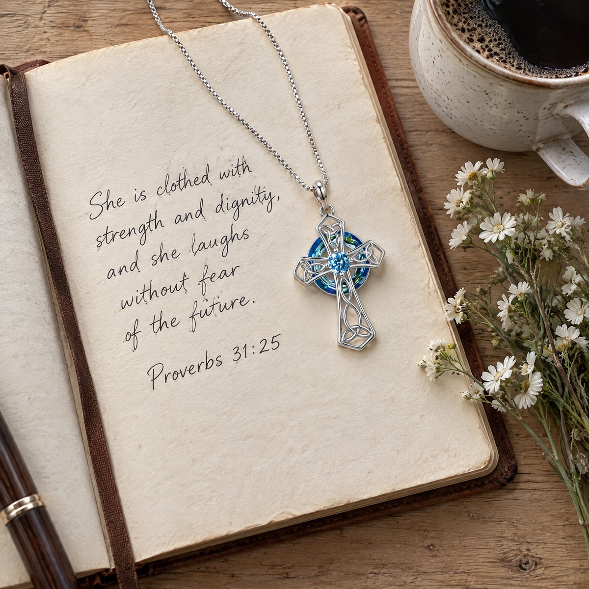 Celtic cross necklace on a journal page, Proverbs 31:25