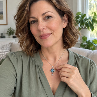 Celtic cross birthstone necklace worn at home