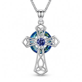 September · Sapphire cross pendant