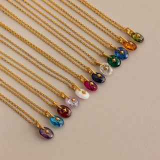 Oval North Star birthstone pendants in every colour