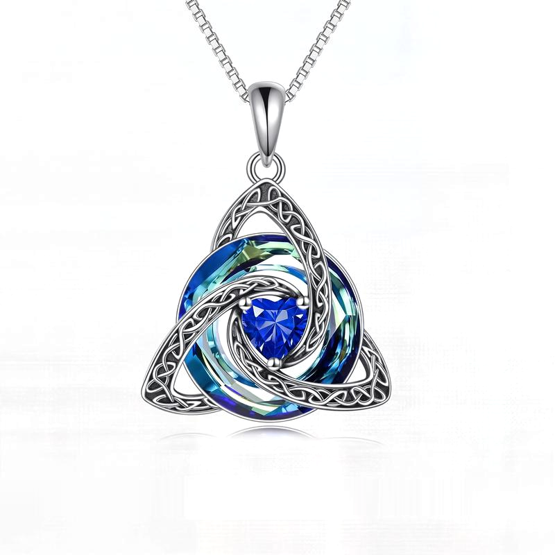 September · Sapphire witch knot pendant