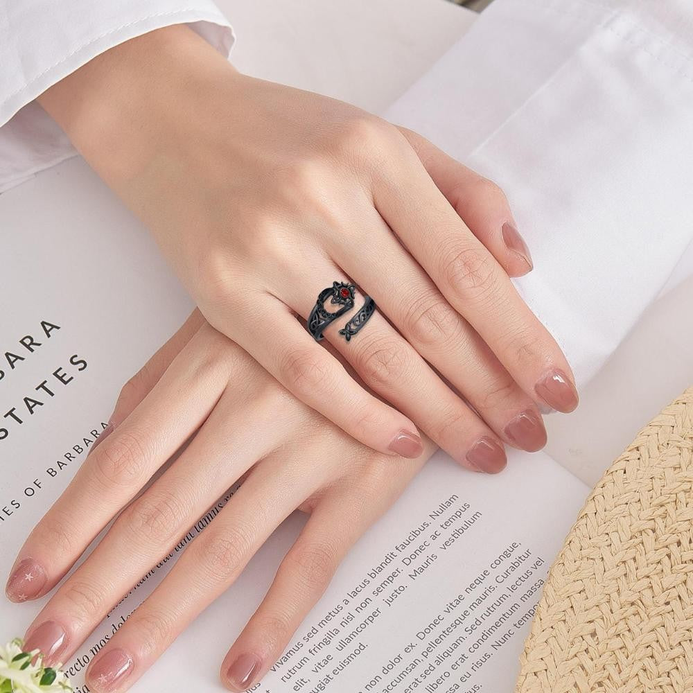 Twilight Knot Ring worn on the index finger