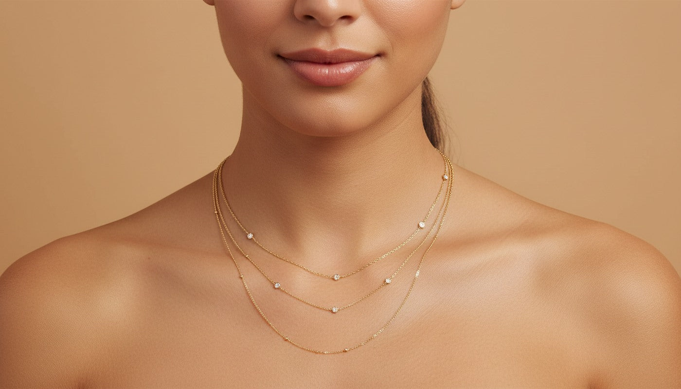 Avera diamond station necklace layered with two finer chains