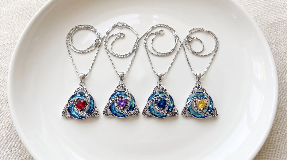 Five witch knot necklaces with different birthstone hearts